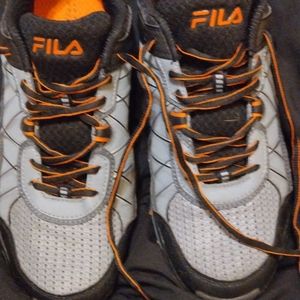 Pair of Fila tennis shoes size 11